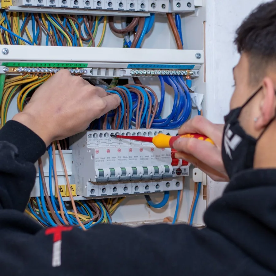 Distribution board being rewired by an A Electric Solutions electrician