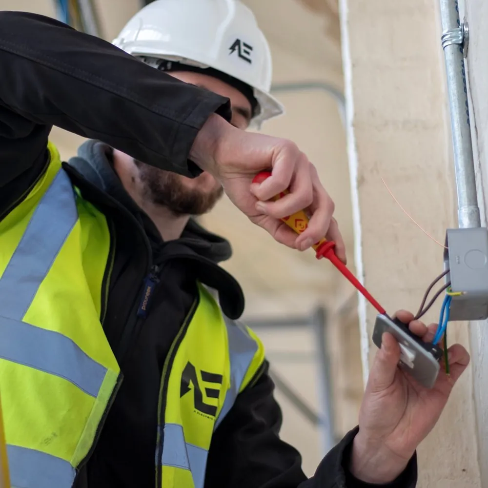 A Electric Solutions electrician working on a London rewire